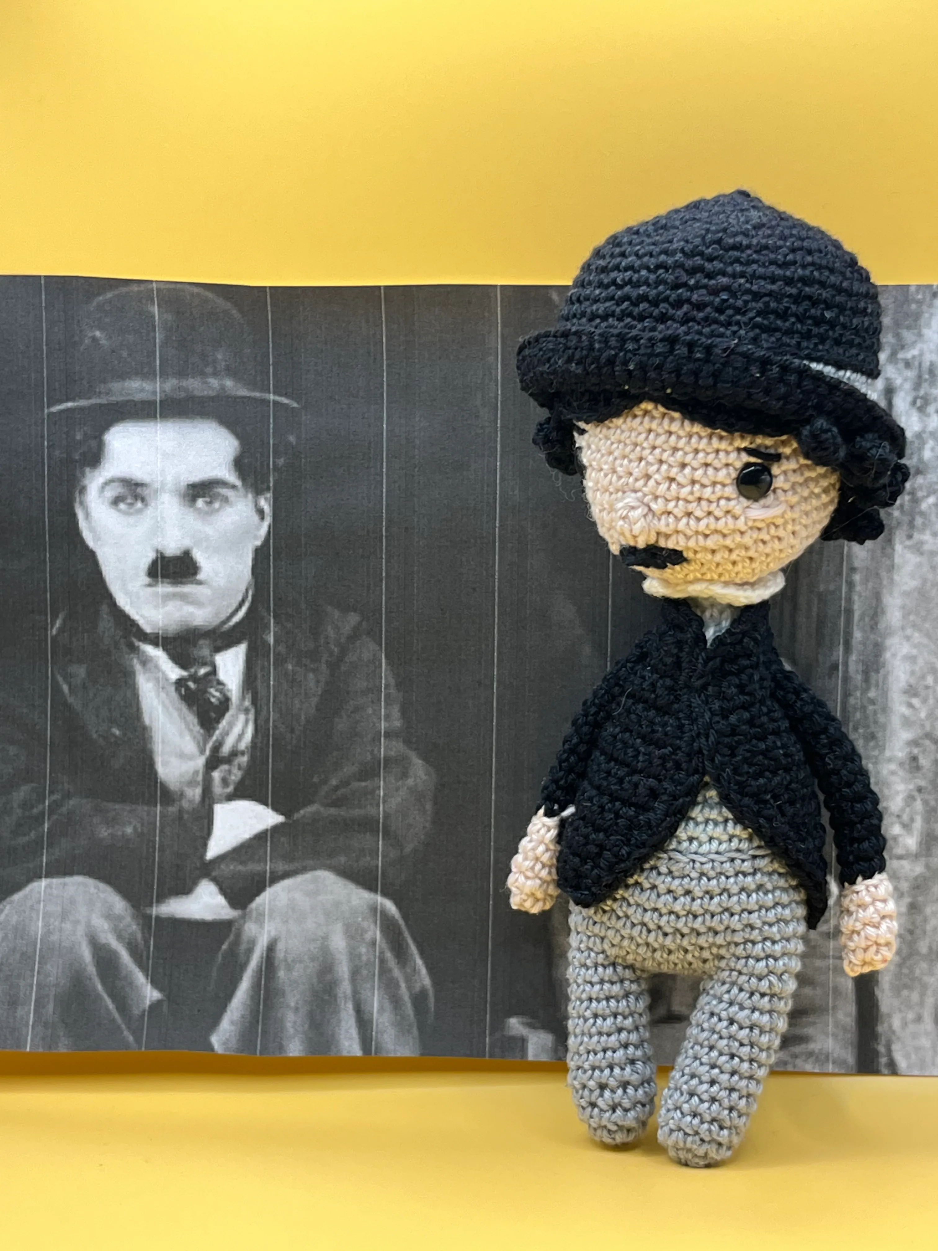 Alternate view of Chaplin’s handmade dark suit and cane