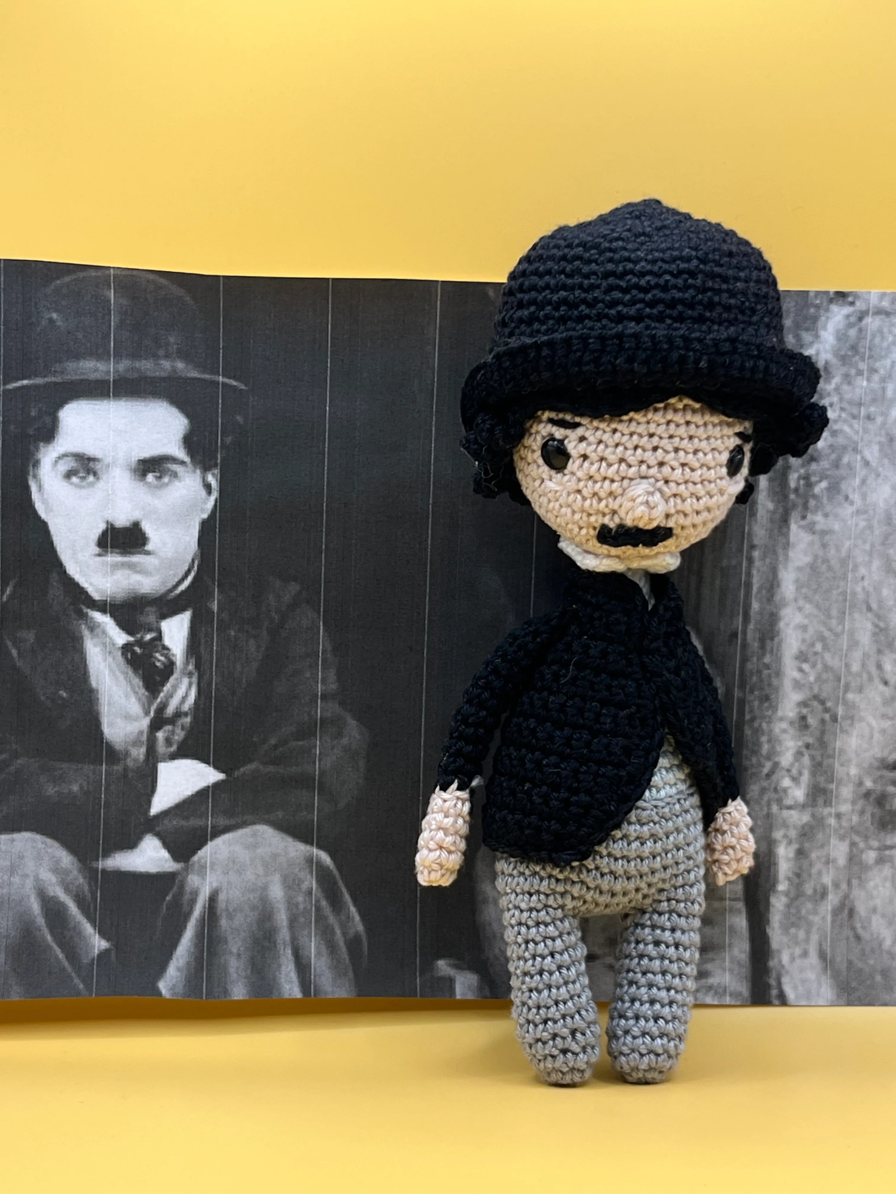 Close view of Charlie Chaplin’s embroidered expression