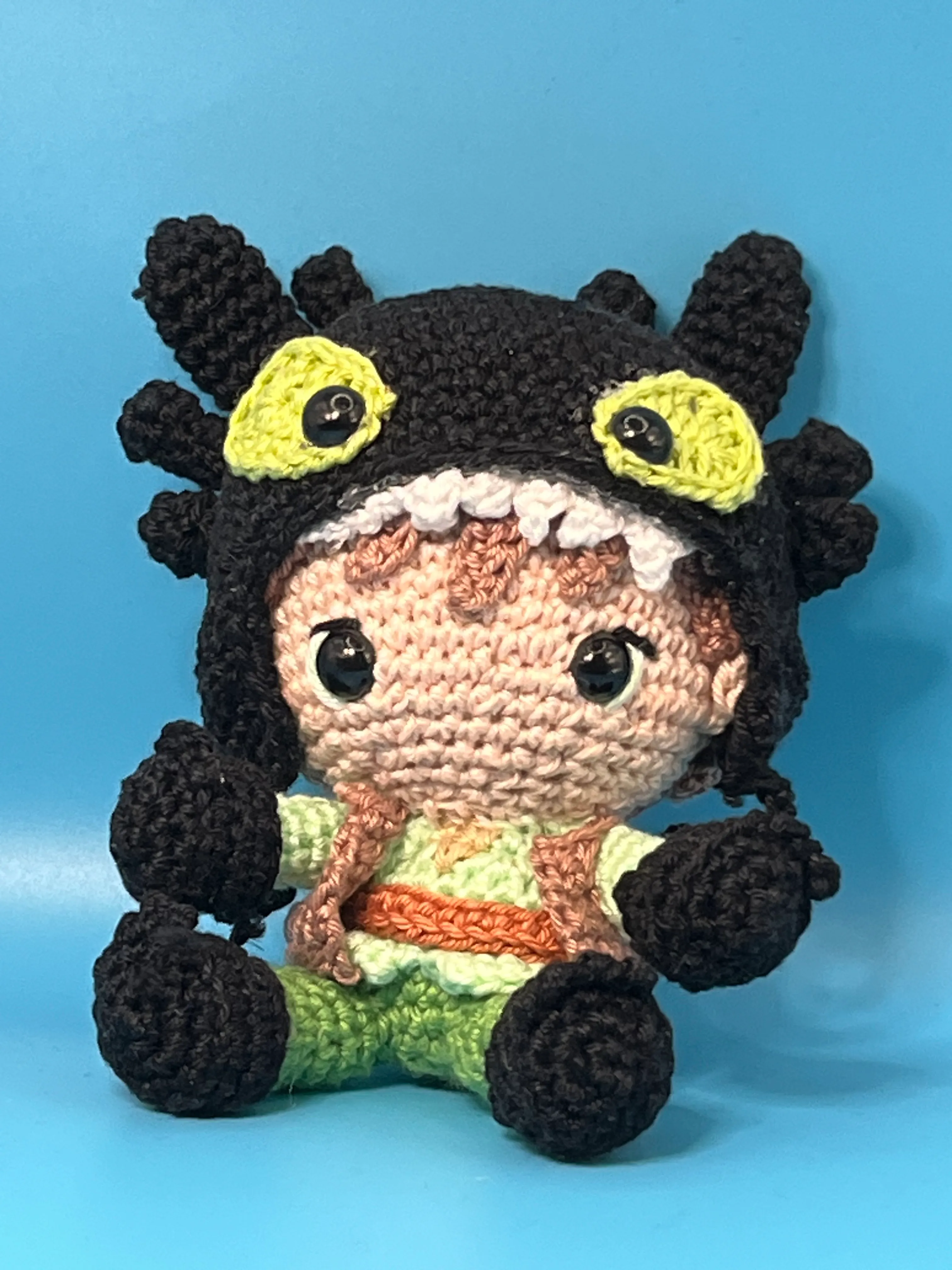 Close view of Hiccup’s embroidered expression and clothing details