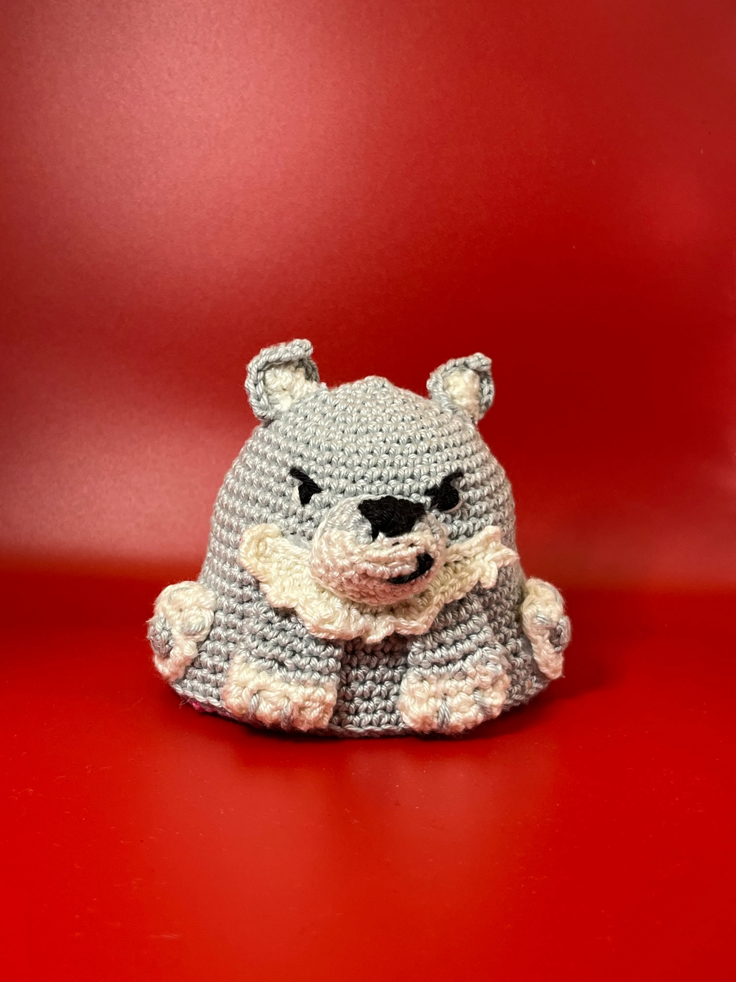 Alternate view of the wolf’s crocheted ears, snout, and paws