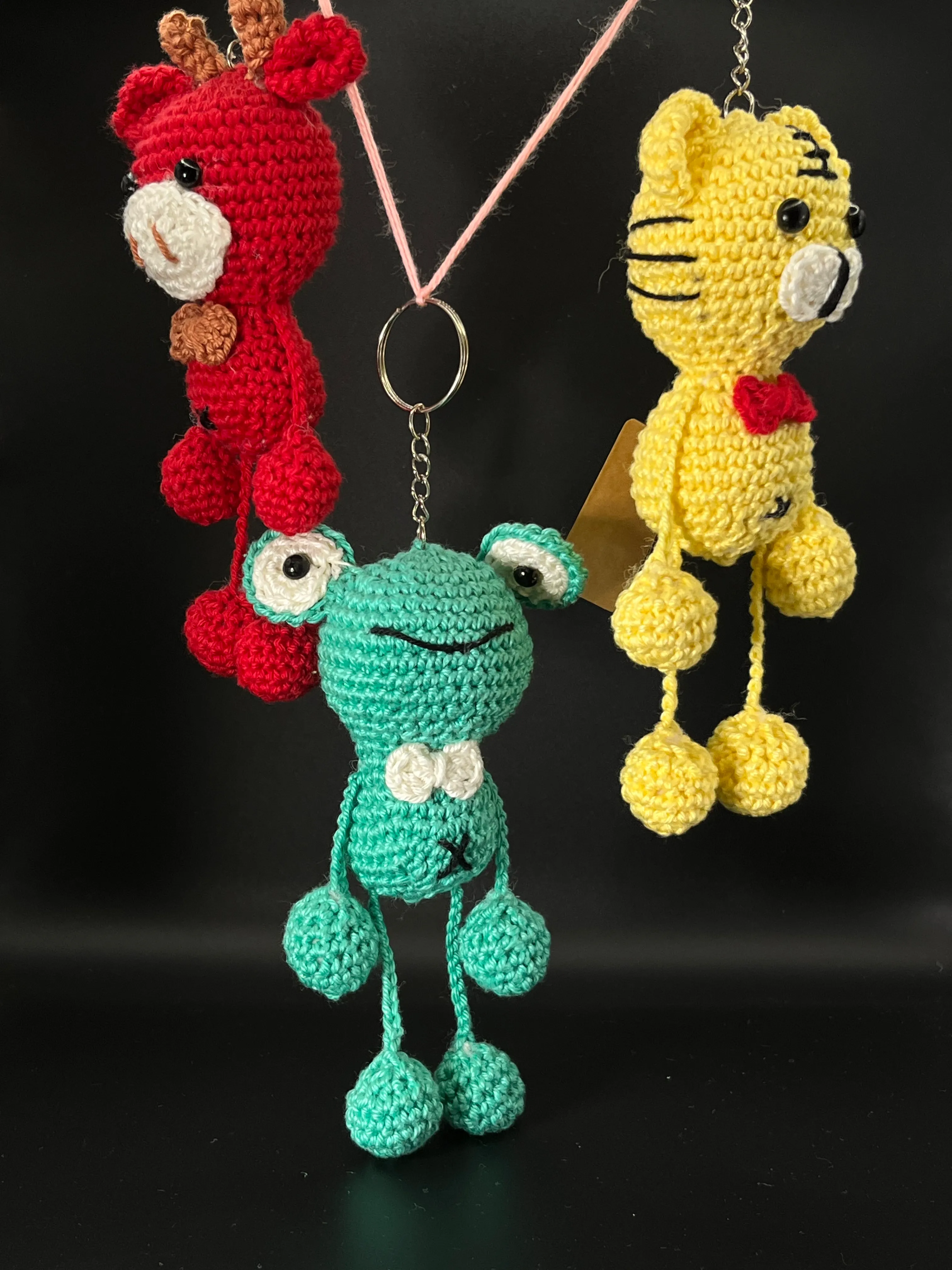 Close view of the red reindeer crochet keyring