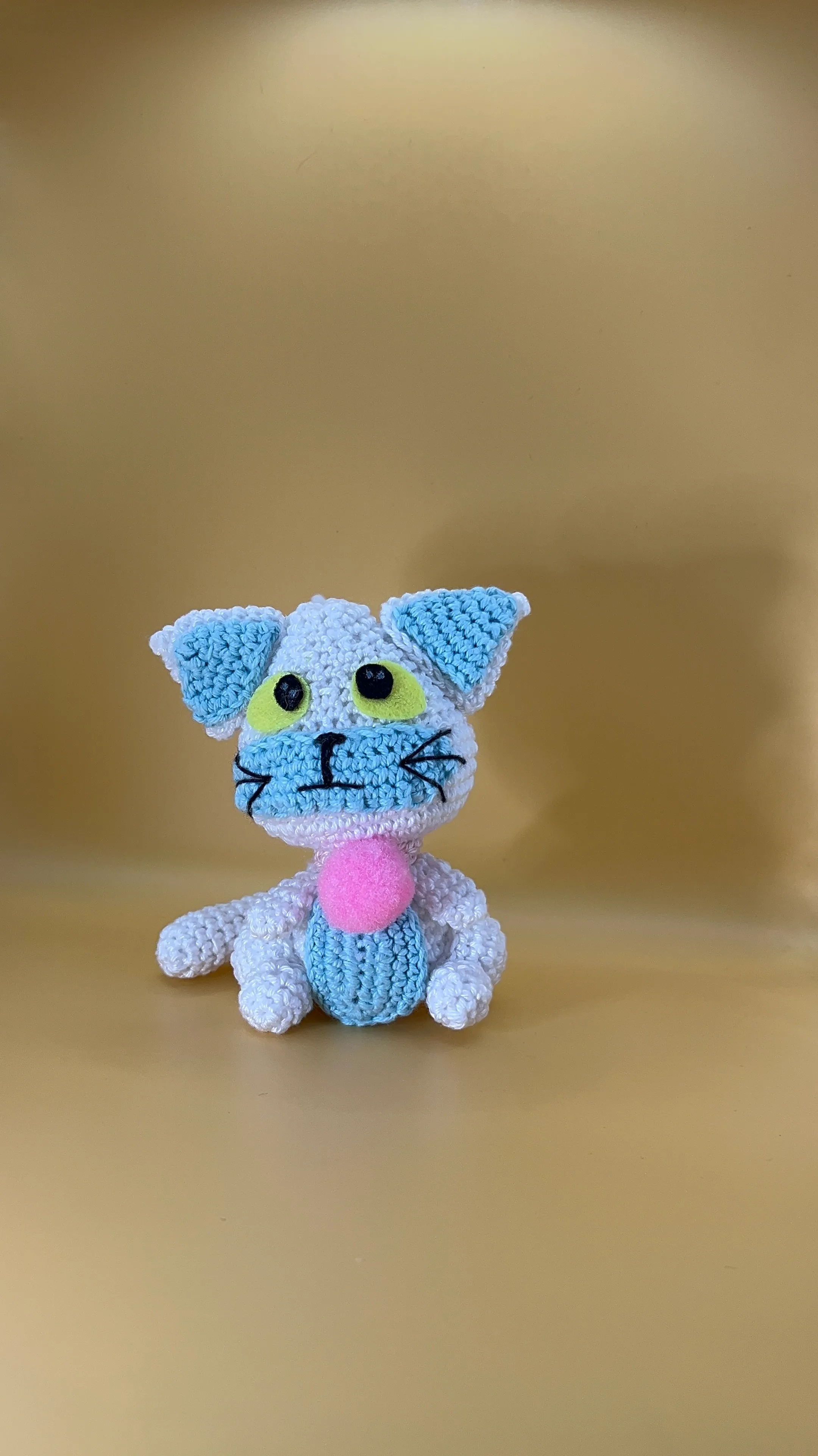 Alternate view showing Posi’s blue ears and white body